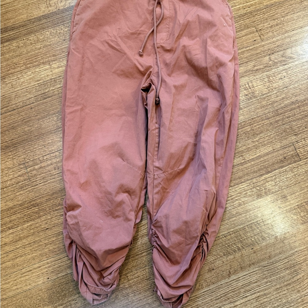 FP Movement by Free People woman’s rust parachute pants